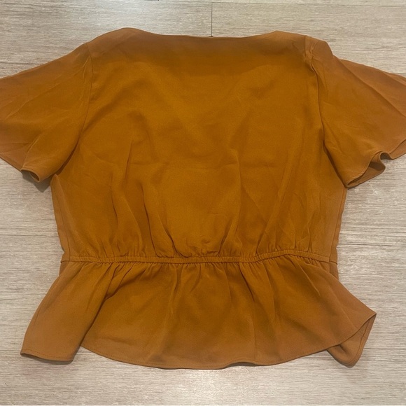 OLM Flutter Sleeve Peplum Blouse - Picture 4 of 5